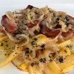 Ronda: Restaurante Casa Maria / Hauptspeise: Schweinefilet mit karamellisierten Zwiebeln Ronda: Restaurante Casa Maria / Hauptspeise: Schweinefilet mit karamellisierten Zwiebeln
